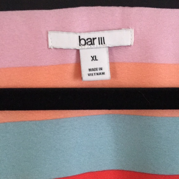 Nice striped dress with reddish tones. - Picture 2 of 8